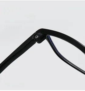 Detail macro view of durable metal hinge on black TR90 anti-blue light reading glasses