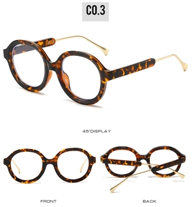 Detailed views of round tortoiseshell glasses with slim gold metal temples and frames