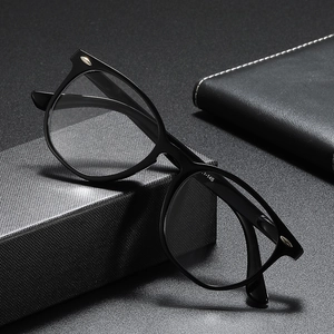 Classic black oval frame reading glasses with vintage silver rivets and spring hinges