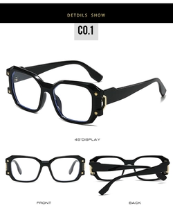 Detailansicht der quadratischen schwarzen Brille mit edlen goldenen Metallniet-Scharnieren