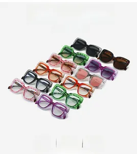 Matrix display of colorful square oversized eyewear frames in various trendy acetate finishes