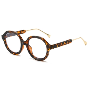 Retro round tortoise glasses with gold metal temples and blue light blocking lenses