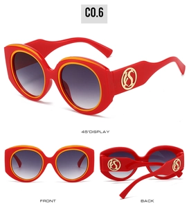 Vues détaillées de lunettes de soleil ovales oversize avec monture rouge-jaune et dégradé