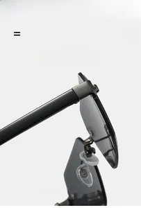 Close-up of metal hinges and silicone nose pads on rimless rectangular sunglasses