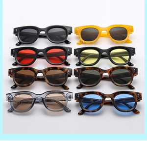 Matrix of oval retro sunglasses with thick frames and assorted color lenses