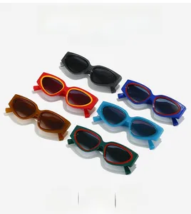 Detailed flat lay of small frame cat eye sunglasses in various multi-color combinations