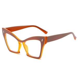 Retro cat-eye glasses frame with orange and brown color-blocking and clear lenses