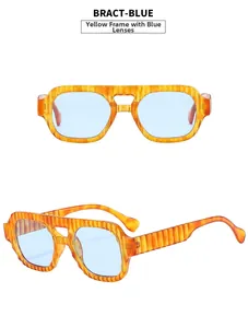 Macro view of retro yellow textured frames with blue lenses for aviator sunglasses