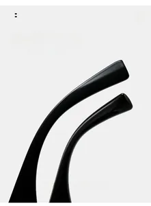 Detail of curved ergonomic temples on black sunglasses for comfortable all-day wear