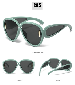 Multi-angle view of mint green oversized sunglasses with gold accents and dark lenses