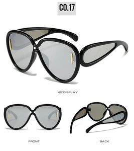 Three-angle view of oversized sunglasses with black frames and gold metal accents