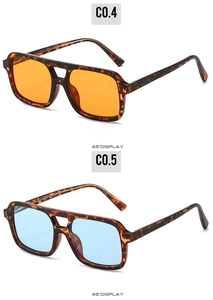 Detail view of retro tortoise sunglasses with orange and light blue lenses in 45-degree angle
