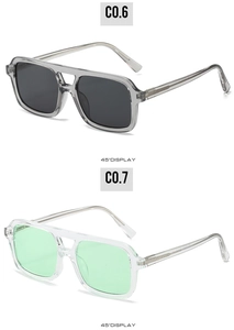 Detail view of double bridge sunglasses showing transparent frames and visible metal cores
