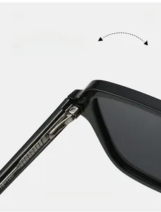 Close-up of durable metal hinge and 19-140 specs on black acetate sunglasses