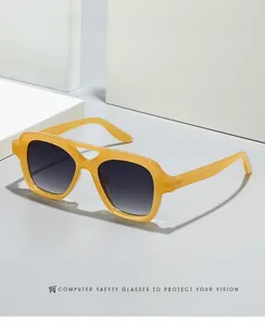Detail of 2024 double-bridge pilot computer glasses with amber transparent frames