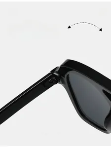 Close-up of durable metal hinge on black double-bridge aviator sunglasses