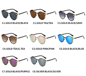 Multiple stylish cat-eye sunglasses in diverse colors with sleek metallic frames