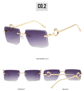 Detailed views of rimless rectangular sunglasses featuring a golden leopard head accent