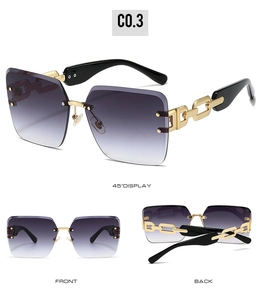 Detail view of rimless square sunglasses with purple gradient lenses and gold chain temples