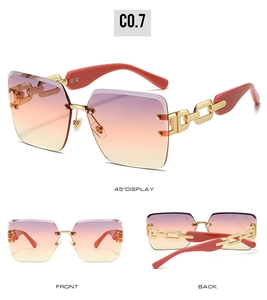 Three-way view of rimless gradient purple sunglasses with golden metal chain temples