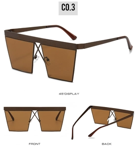 Detail view of square punk sunglasses with flat top and unique metal cross bridge design