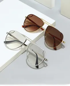 Close-up of classic aviator metal frames with double bridge and gradient lenses detail
