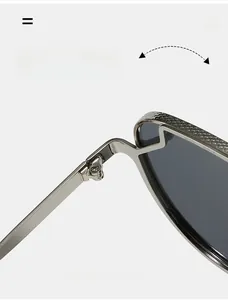 Detailed macro of durable silver metal hinge and textured frame on pilot sunglasses