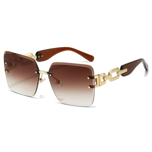 Frameless rimless sunglasses with gradient brown lenses and golden chain metal temples