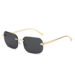 Lunettes de soleil carrées sans monture avec tête de léopard et verres gris taillés