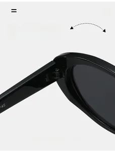 Detail of durable metal hinges and inner temple size markings on oval sunglasses