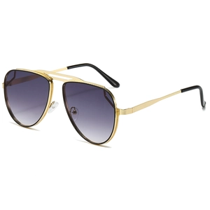 Classic pilot sunglasses with gold metal frame and gradient purple lenses in side view