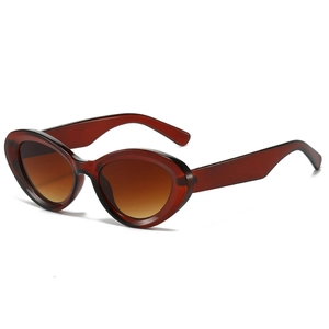 Retro cat eye sunglasses for women with dark brown translucent frames and gradient lenses