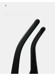 Macro detail of glossy black curved temple arms for ergonomic comfortable eyewear wear