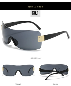 Three-angle view of oversized rimless shield sunglasses with gold metal decorative hinges