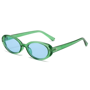 Vintage oval narrow sunglasses with transparent green frames and blue lenses in 45-degree view