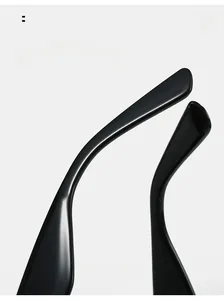 Detail view of black curved ergonomic sunglasses legs with high-gloss finish