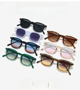 Detailed array of retro square sunglasses in various colors with gradient lenses