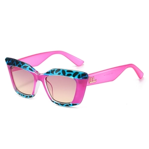 Fashionable pink tortoiseshell cat eye sunglasses for women with brown gradient lenses