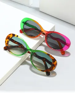 Detail of vintage oval sunglasses with colorful gradient frames and tortoiseshell temples