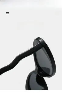 Macro detail of high-elasticity lightweight black sunglasses hinge and curved temples