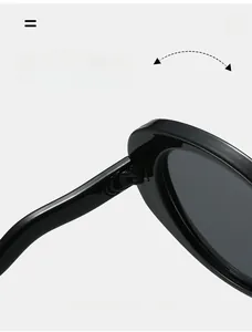 Close-up of durable metal hinge on black oval sunglasses for long-lasting use