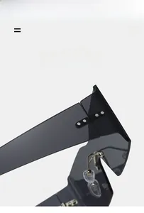 Detail view of one-piece black lenses with reinforced metal rivets and flexible hinges