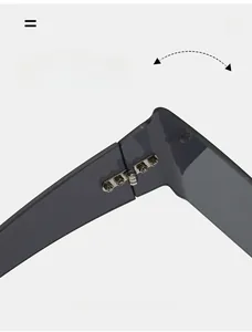 Close-up of durable silver metal hinges and seamless joints on square rimless sunglasses