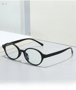 Detailed view of oval black anti-blue light glasses with retro minimalist metal frames