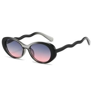 Retro oval sunglasses with wavy temples and gradient lenses on a white background