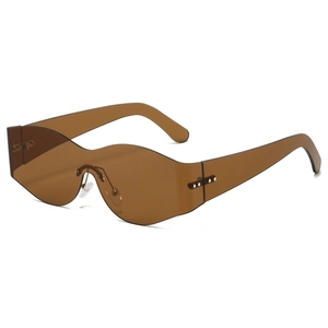 Oversized rimless wave shaped sunglasses with amber lenses and stylish metal rivets