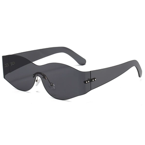 Futuristic dark grey one-piece oversized sunglasses with wavy edges and silver rivets