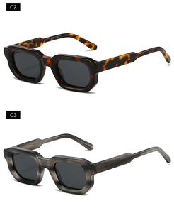 Macro detail of thick retro square sunglasses in tortoiseshell and translucent grey finish