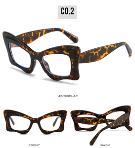 Three angles of tortoise shell cat-eye glasses frames with blue light blocking lenses