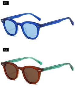 Close-up of vintage oval thick frames with classic double rivets and acetate temples